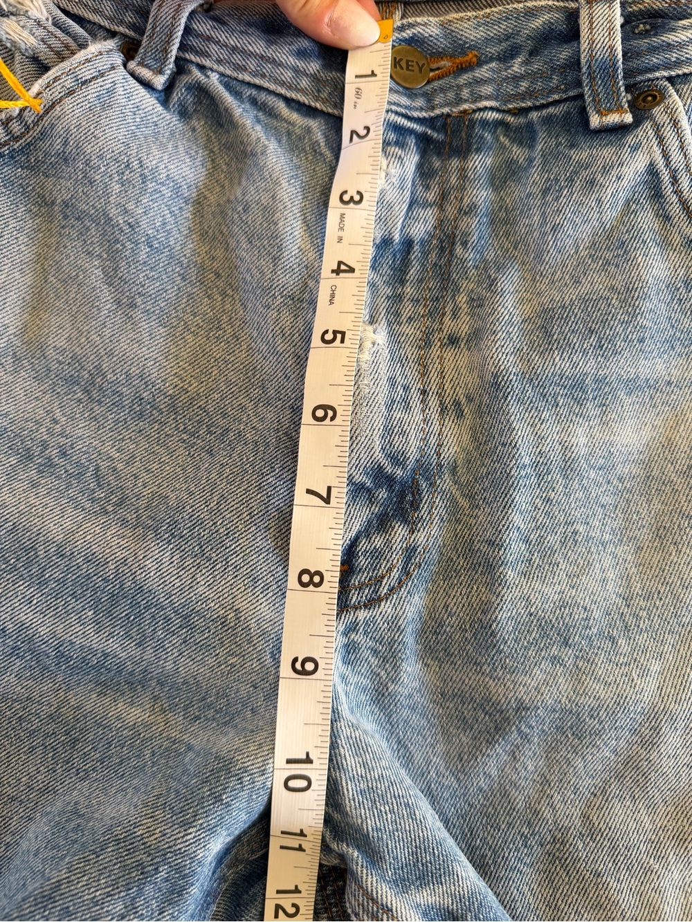 Key Light Wash Distressed Denim Cutoff Shorts - Picture 5 of 7